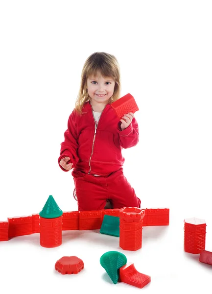 Liten flicka med röd block — Stockfoto