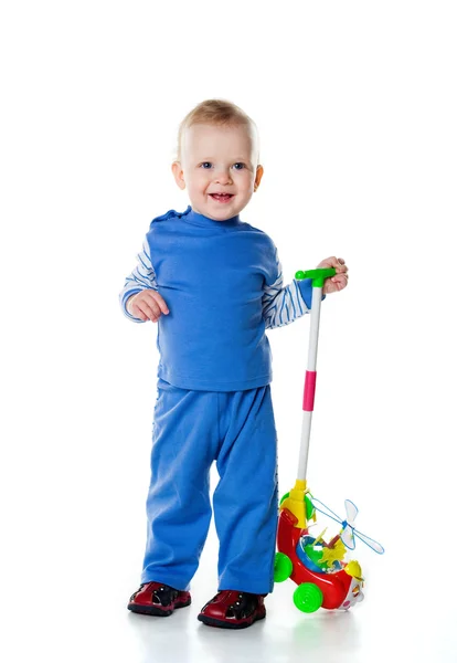 Netter kleiner Junge mit dem Spielzeughubschrauber — Stockfoto