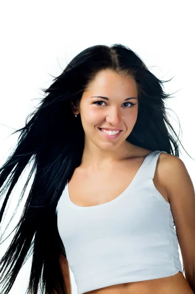 Mujer joven con un pelo hermoso — Foto de Stock