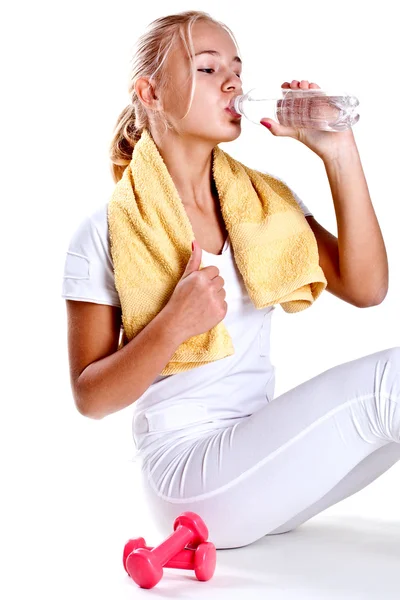 Woman holding a bottle of water — Stock Photo, Image