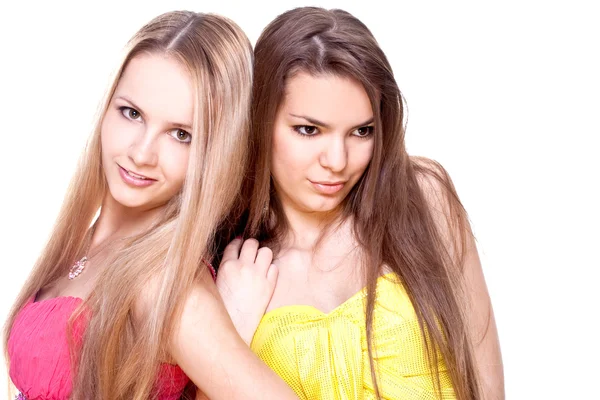 Two beautiful women in a colored dress — Stock Photo, Image