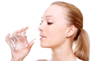 Beautiful woman drinking water clipart