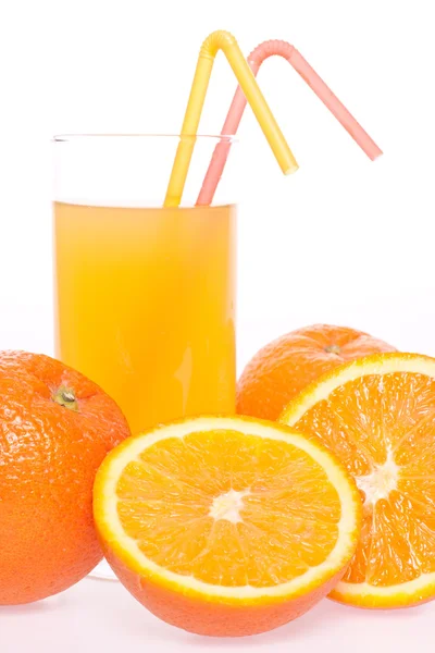 Grapefrukt och juice i glas — Stockfoto