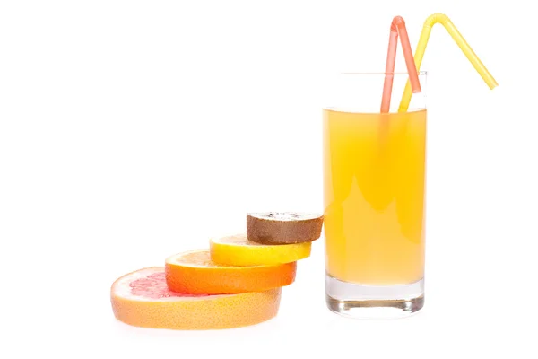 Grapefrukt och juice i glas — Stockfoto