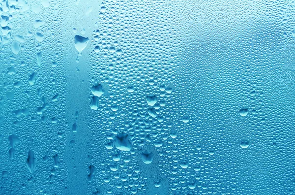 Синяя текстура капли воды — стоковое фото