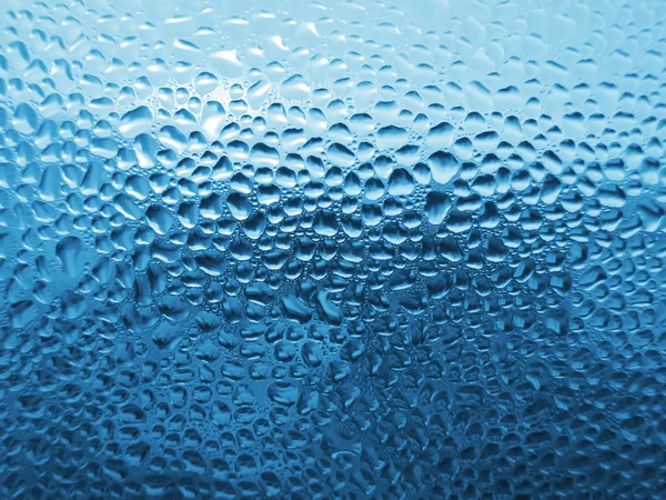 Naturliga vattendroppar på glas — Stockfoto