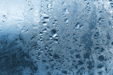 Frozen water drops on window clipart