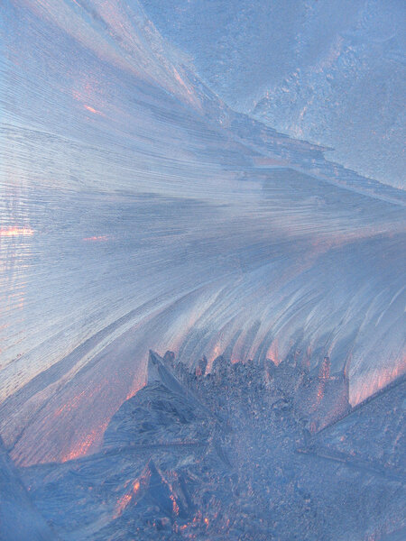 Frost and sunlight on glass