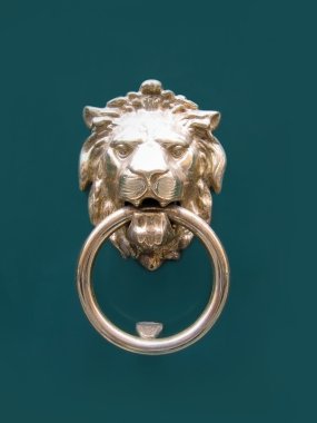 Head of lion doorknocker clipart