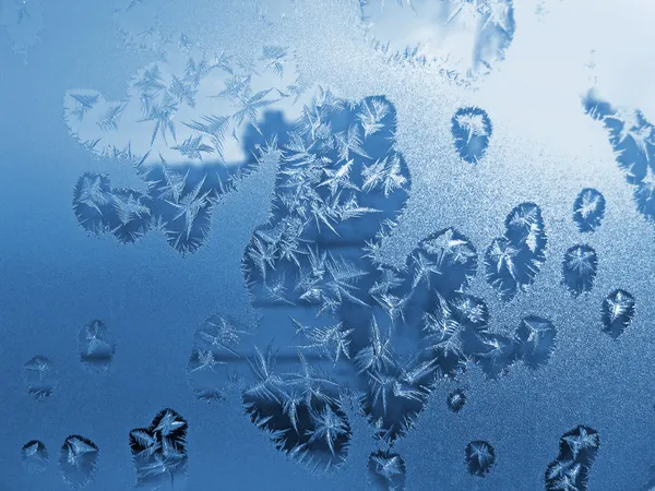 Frost icy flowers on a glass — Stock Photo, Image