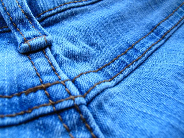 Фон синих джинсов — стоковое фото