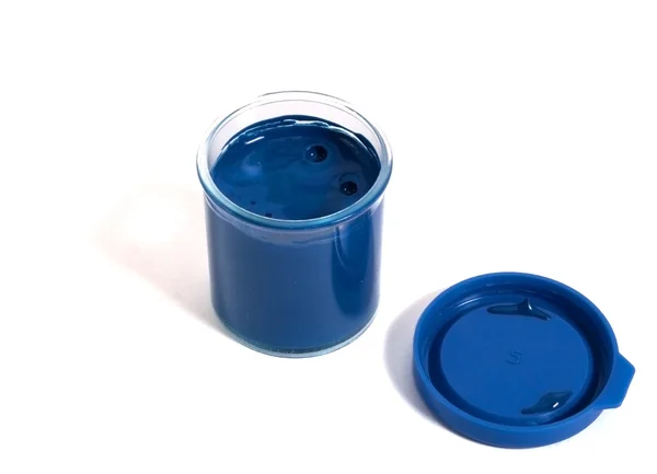 Container with blue paint — Stock Photo, Image