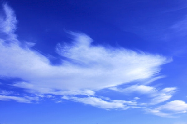 Beautiful clouds in the blue sky drifting away
