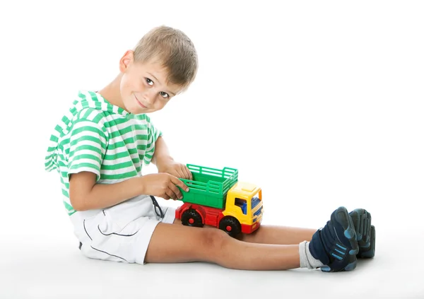 Junge mit einem Spielzeug — Stockfoto