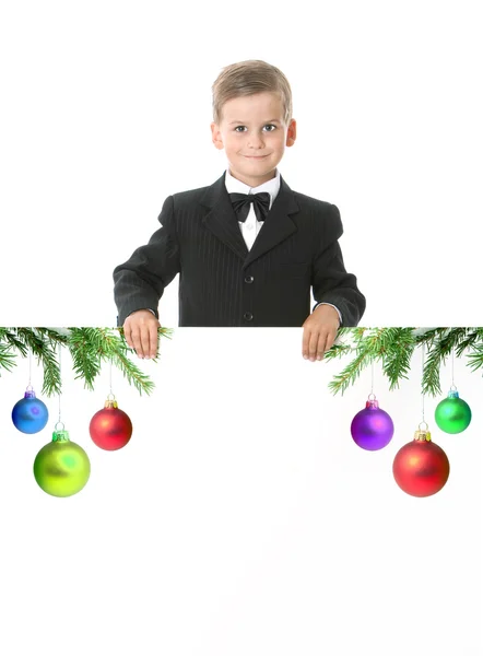 Boy holding a christmas banner — Stock Photo, Image