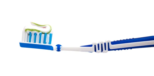Зубная щетка и зубная паста — стоковое фото