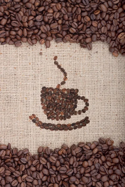 Коричневі смажені кавові зерна . — стокове фото