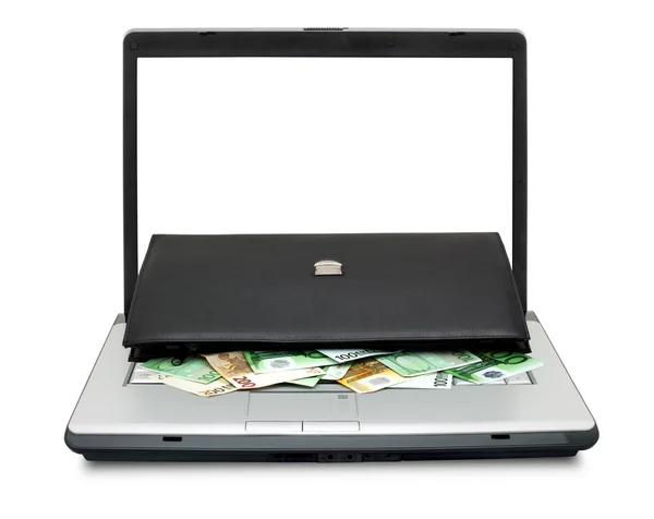 Laptop mit Geld öffnen — Stockfoto