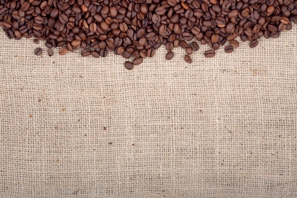 Granos de café tostados marrón. —  Fotos de Stock