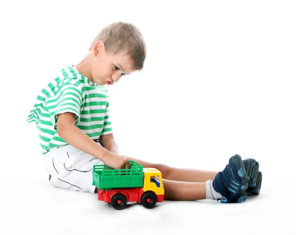 Pojke med en leksak — Stockfoto