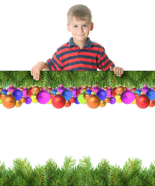 Αγόρι, μία πινακίδα Χριστουγέννων — Φωτογραφία Αρχείου