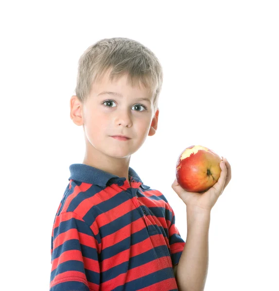 Chłopiec trzyma jabłko — Zdjęcie stockowe