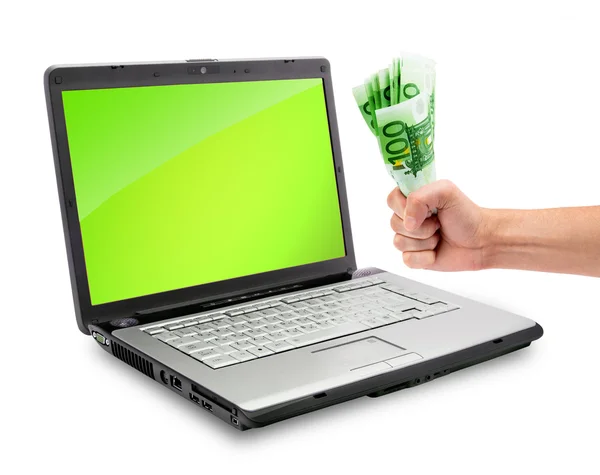 Laptop und Geld — Stockfoto