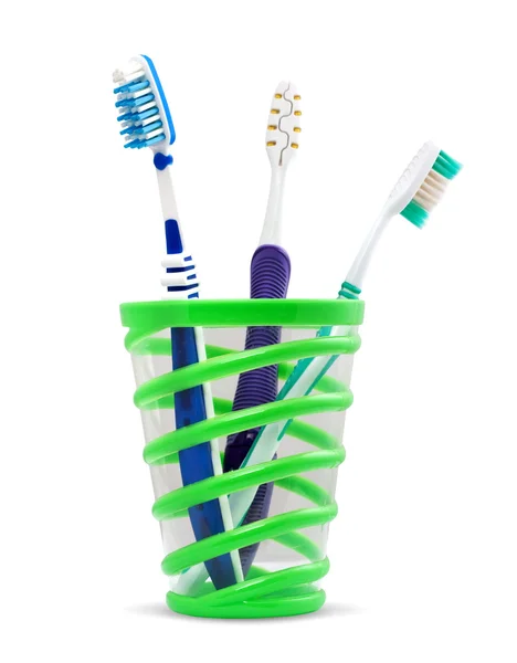 Colorfull tandborstar i en kopp — Stockfoto