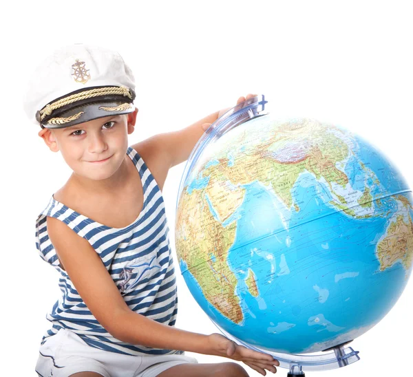 男孩抱着一个地球仪 — 图库照片