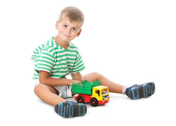 Boy holding a car — Stock Photo, Image