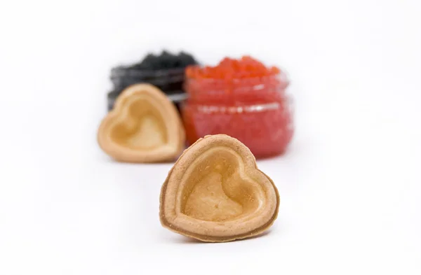 Caviar rouge et noir dans un cœur — Photo