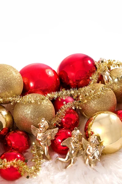 Brinquedos de Natal, anjos e costela de ouro — Fotografia de Stock