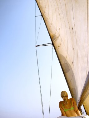 Girl under sail. clipart