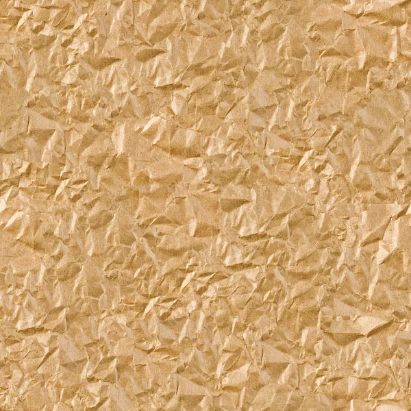 Brown wrinkled paper seamless background — стокове фото