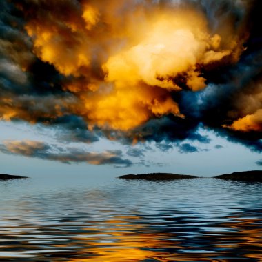 Dramatic sky over water. clipart