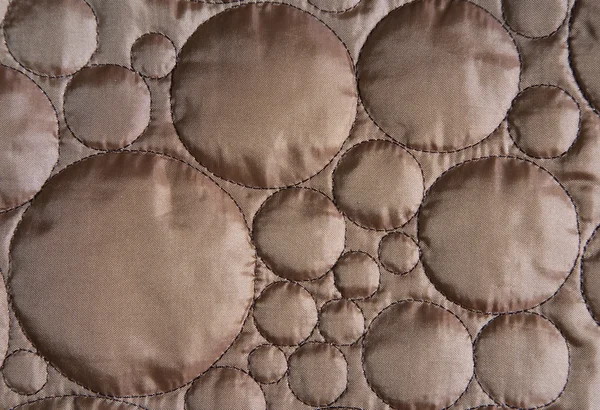 銅円パターンの布 — ストック写真