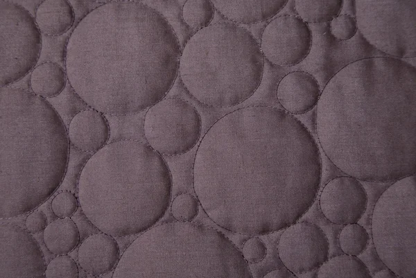 茶色の円パターンの布 — ストック写真
