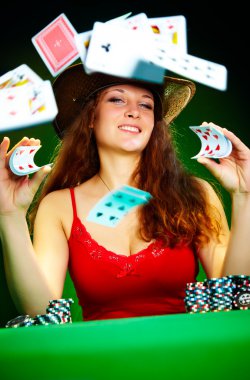 Photo of the girl with playing cards clipart