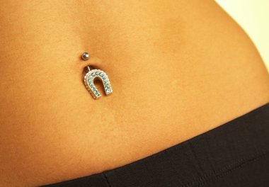 Female navel with piercing clipart