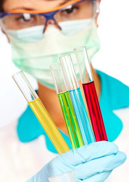 Scientist in laboratory with test tubes — Stock Photo, Image