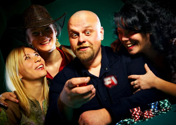 Company of friends plays dice — Zdjęcie stockowe