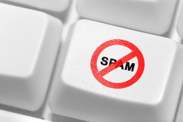 O botão com um emblema de um antispam — Fotografia de Stock