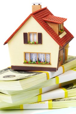 House on packs of banknotes clipart