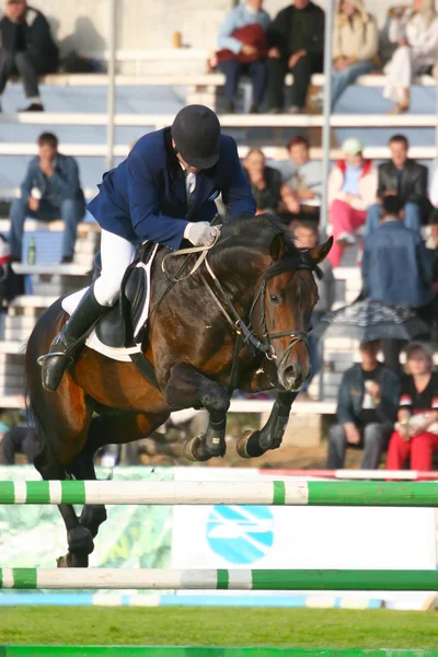 Jockey bir engel atlar — Stok fotoğraf