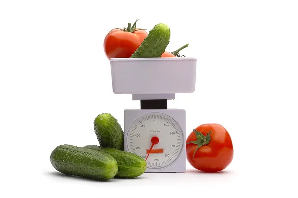 Vegetables on weights — Stock Photo, Image