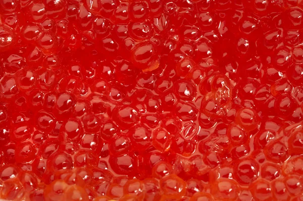 Abstracte achtergrond van rode kaviaar — Stockfoto