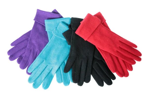 stock image Multi-coloured woollen gloves on a white