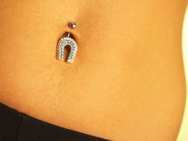 Female navel with piercing clipart