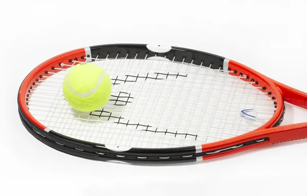 Tennis racket with a ball on a white bac — Stock Photo, Image