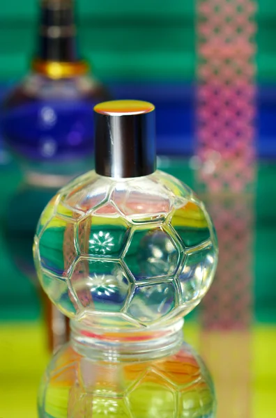 Glass bottles with perfumery. On a color — Stock Photo, Image